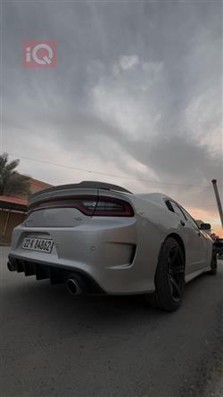 دۆج چارجەر